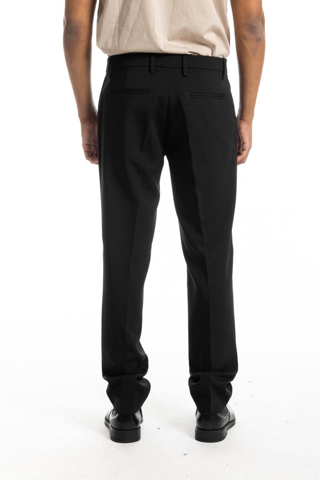 Pantalone slim regular in tessuto stretch ritorto