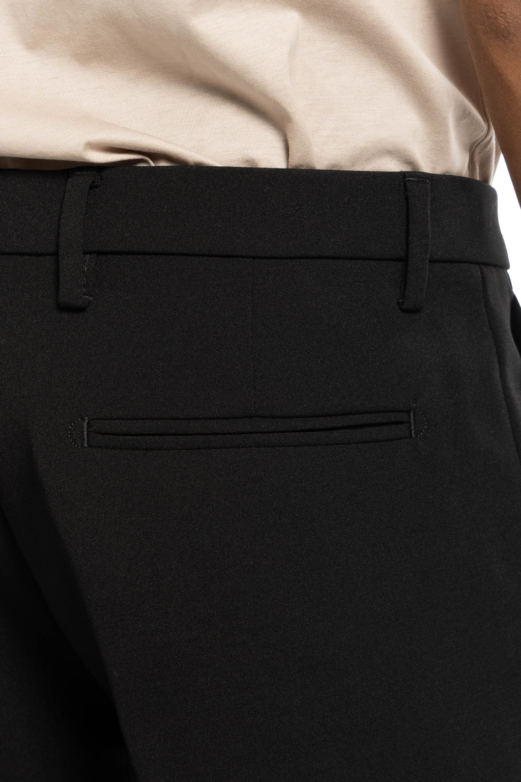 Pantalone slim regular in tessuto stretch ritorto